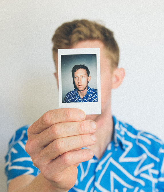 Person Holding a Photograph