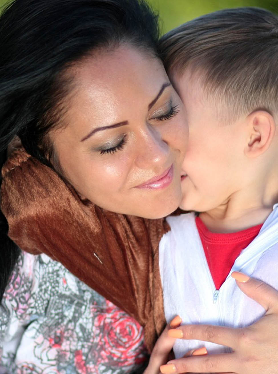 Mother Holding Her Child Mother Holding Her Child