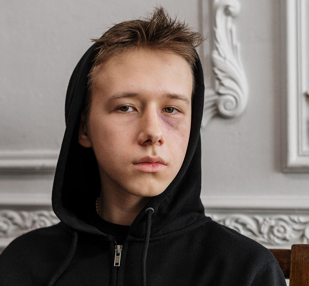Teenage Boy Wearing a Black Hoodie Teenage Boy Wearing a Black Hoodie