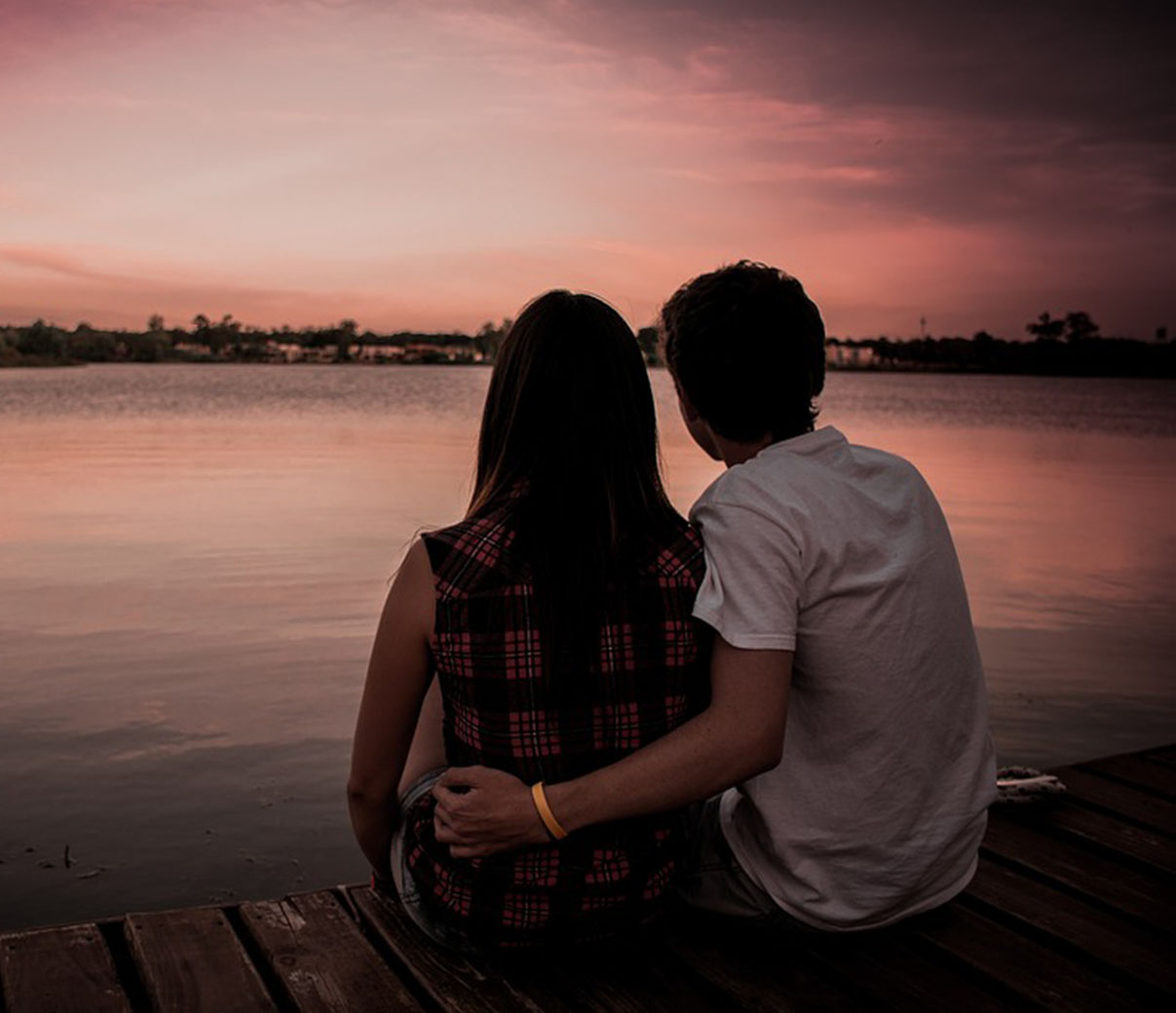 Couple Watching the Sunset Couple Watching the Sunset